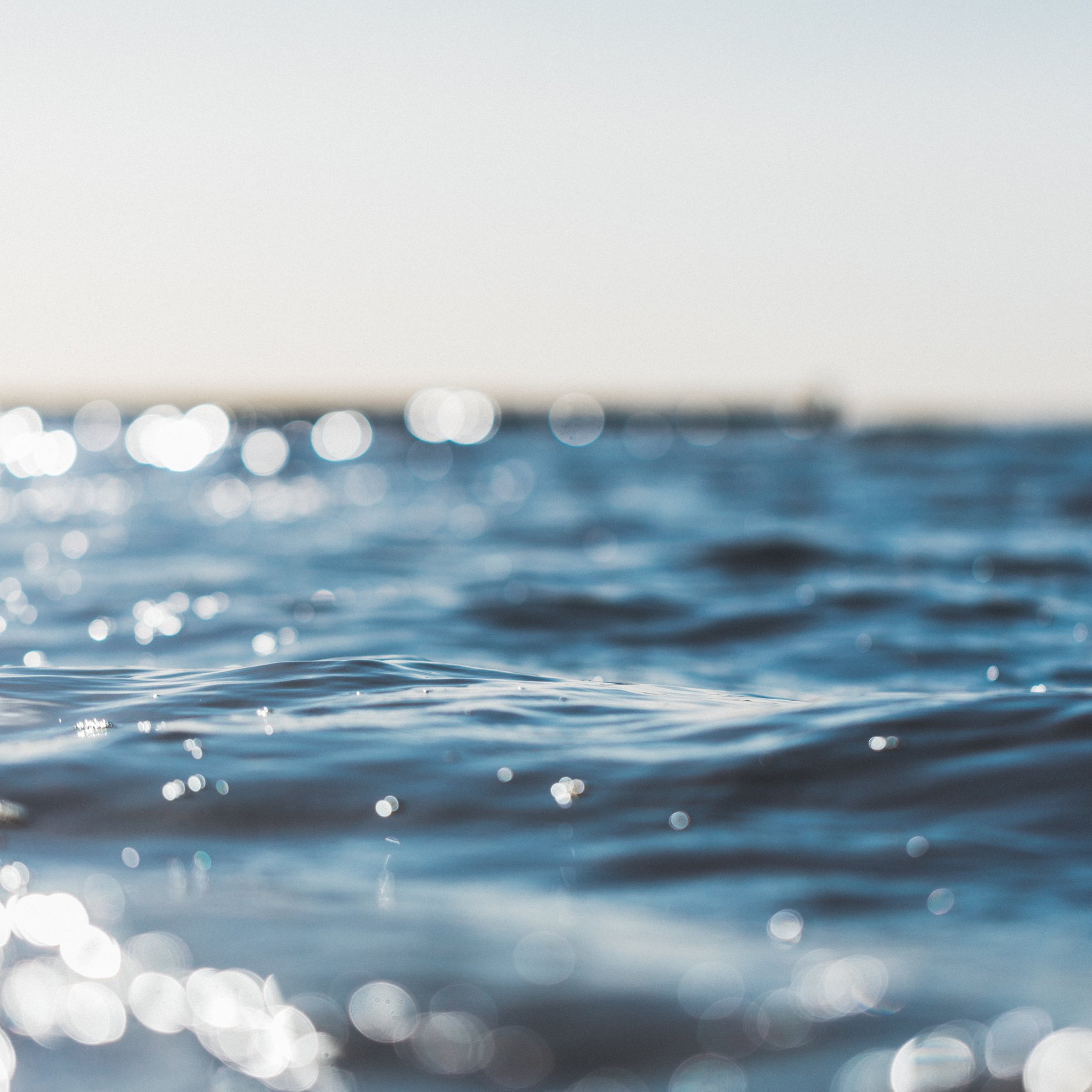 Sunny little waves by the beach